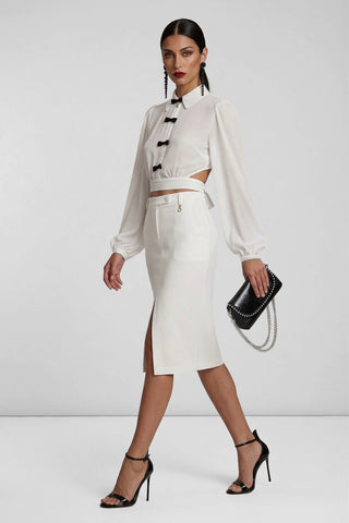 JANETTE long-sleeve blouse with bows and criss-cross back
