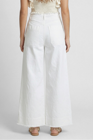 Pantaloni donna wide leg JULIPET gamba svasata bordi sfrangiati bianco cotone Justine&Co