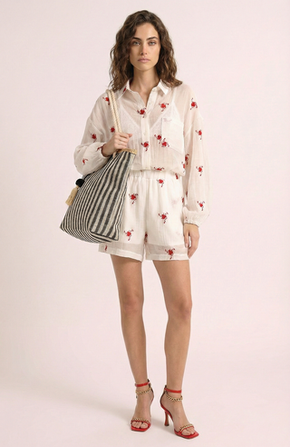 Borsa a righe LAETITIA con pon pon e trama glitter