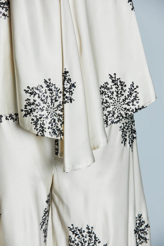 Coordinato donna FORTALEZA top elegante e pantalone palazzo vita alta in raso fluido con ricamo nero paillettes avorio Relish