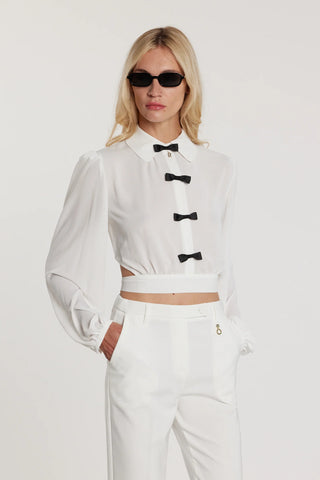 JANETTE long-sleeve blouse with bows and criss-cross back