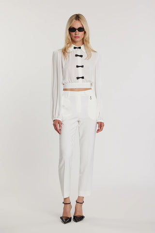 JANETTE long-sleeve blouse with bows and criss-cross back